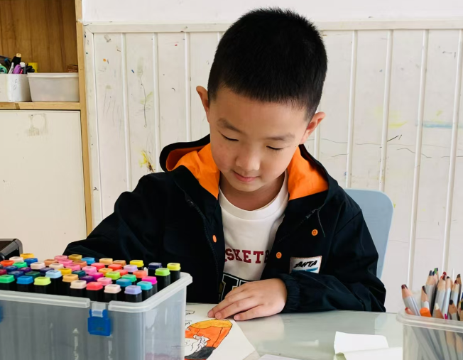 光荣的升旗手：一（3）班周承淏